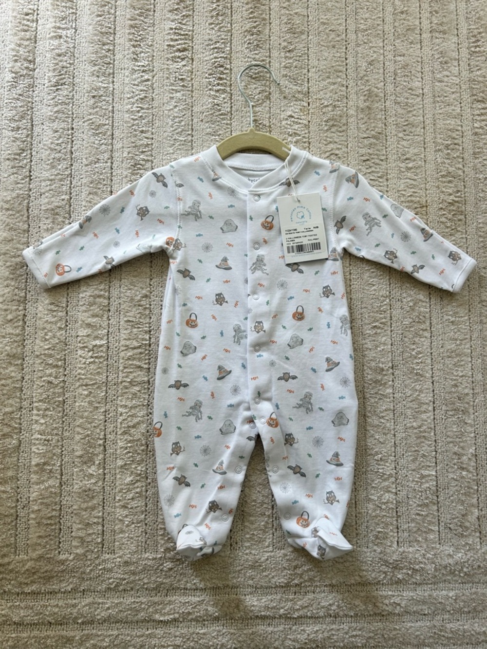 Baby Footed One-Piece in White with Neutral Animal Print